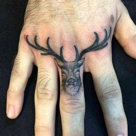 deer tattoo on hand